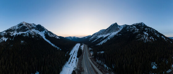 Aerial Panoramic View of a scenic Highway passing in the Canadian Mountain Landscape during a...