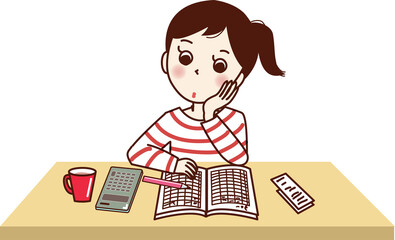 家計簿をつける若い女性。