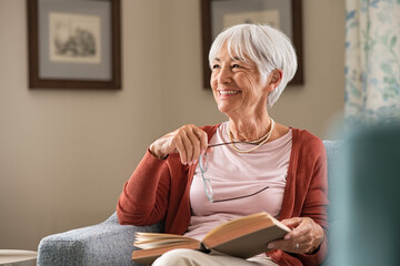 Happy senior woman smiling at home - obrazy, fototapety, plakaty