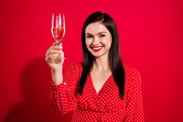 Photo of cool brunette lady hold glass drink wear red dress isolated on vivid color background