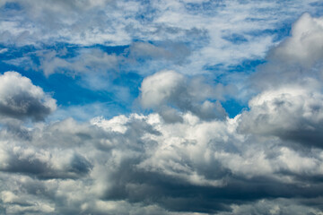 dramatic white clouds before storm