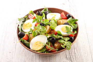 mixed salad with egg with tomato and potato