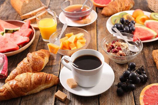 full continental breakfast with tea, coffee,  croissant and fruit