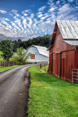Fototapeta na wymiar Two barns on rural road in North Carolina