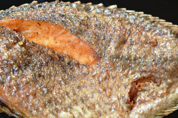 deep fried snake skin catfish or gourami on dish
