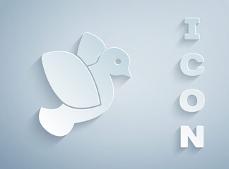 Paper cut Dove icon isolated on grey background. Paper art style. Vector