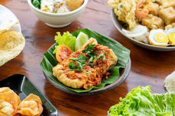 Indonesian specialities made from tofu are served on the table.