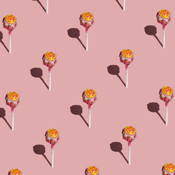 Krakow, Poland - 21 May 2021. Lollipops chupa chups on a pink pastel background