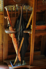 Obraz na płótnie Canvas umbrella stand and vintage umbrellas Scugog shores