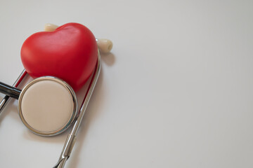 Red heart and stethoscope.World health day concept.
Concept of healthy heart.Healthy life insurance concept.Heart health.