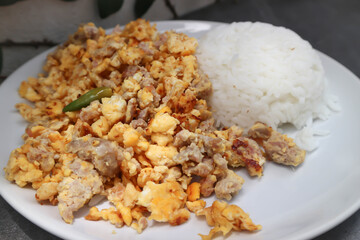 omelet or Thai omelet, Thai omelette or stir fried egg with rice
