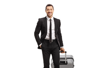 Businessman with a suitcase walking towards the camera