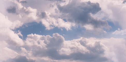 Cloudy sky texture as background with place for text. Banner.