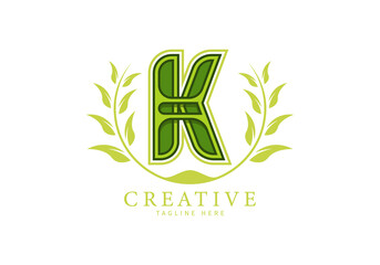Letter K Monogram Logo with leaf ornament as a frame looks more natural, modern design, suitable for templates or brands.