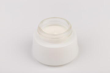 Beauty Cream Texture Close Up. Cosmetic Skincare Product In Jar On White Background. High Quality