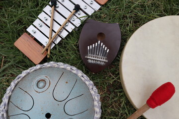 Spiritual healing music instruments, kalimba, hang drum, gong, xylophone, drum for a sound therapy, alternative medicine to synchronise and relax your body and soul