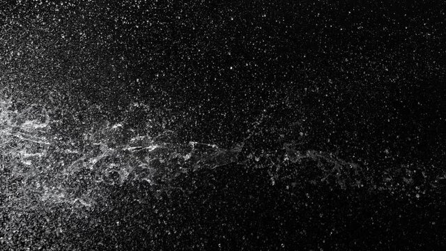 Super slow motion of water splash, isolated on black background. Filmed on high speed cinema camera, 1000fps.