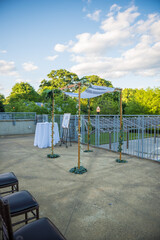 Jewish wedding traditional altar area with custom Chuppah for outdoor ceremony