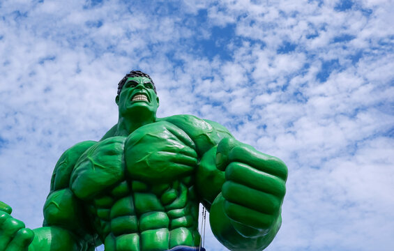 Samut Sakhon, Thailand - June 02,2019: Low angle view of the large outdoor Hulk model display on roadside area against white cloudy and blue sky background