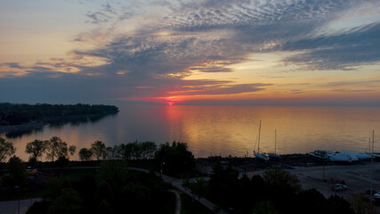 Golden Hour Sunrise sunset on the lake with orange sky 