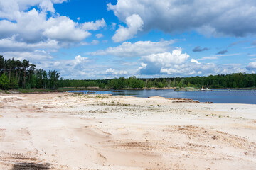 An unnamed forest lake in Buck'schen Schweiz (Buckschen Swiss) - special natural landscape (Moraine - type of glacial deposits, the last ice age) in the Oberspreewald-Lausitz district, Germany.