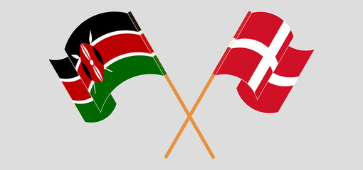 Crossed and waving flags of Kenya and Denmark