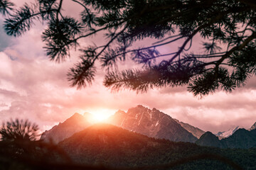 Beautiful pink sunset in the mountains. Landscapes of Ossetia