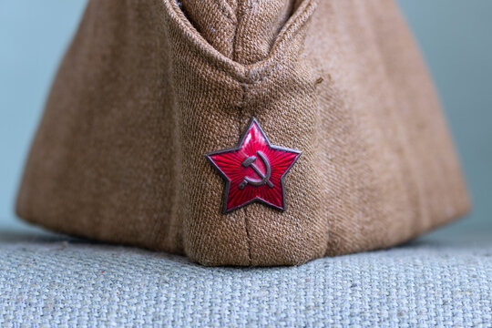 St.Petersburg, Russia - December, 24, 2020: Soviet garrison cap with a red star with a hammer and sickle.