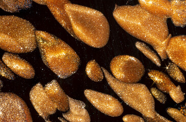 murano black glass with copper inclusions, macro shot