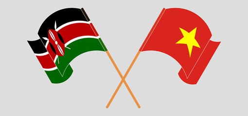 Crossed and waving flags of Kenya and Vietnam