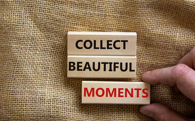 Collect beautiful moments symbol. Wooden blocks with words 'Collect beautiful moments'. Beautiful canvas background, businessman hand. Business, collect beautiful moments concept, copy space.