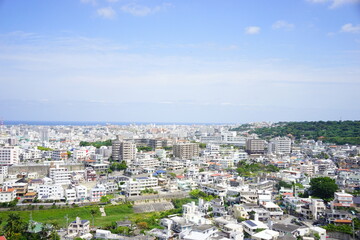 Fototapeta na wymiar Aerial view of Naha city and seashore in Okinawa, japan - 日本 沖縄県 那覇市 街並み 海