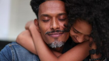 Father and daughter love and affection. Black African ethnicity family caring - Powered by Adobe