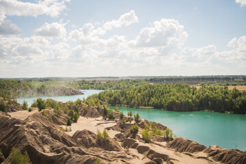 Russia, Tver region, konduki blue river, green forest, blue sky