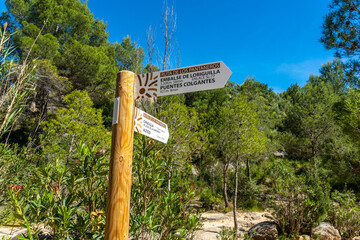 Route of the Pantaneros towards the hanging bridges in the Loriguilla reservoir. Chulilla town in...