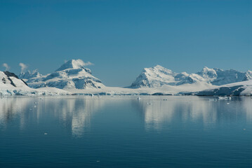 Lemaire strait coast, mountains and icebergs, Antartica