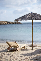 beach chairs and umbrella