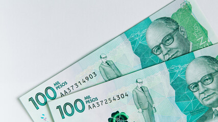 colombian money, one hundred thousand pesos on white background