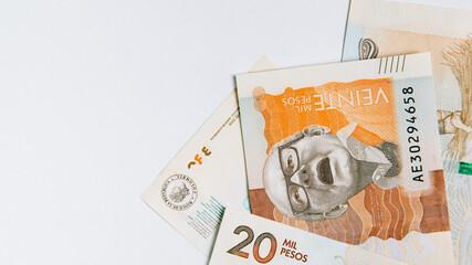 colombian money, twenty thousand pesos on white background
