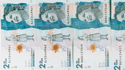 colombian money, two thousand pesos on white background