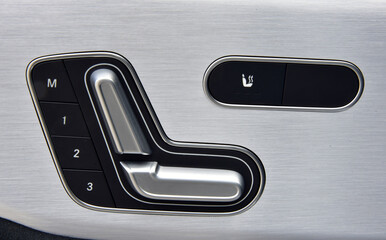 Buttons for adjusting seat position