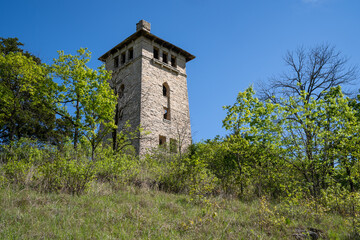 Fototapeta na wymiar Old tower, abandoned, at Ha Ha Tonka State Park in the Lake of the Ozarks, Missouri on a spring day