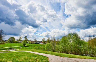 Fototapeta na wymiar Clouds over Hemmesta Sjöäng (Lake meadow) on Värmdö outside Stockholm