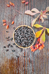 Barberry dried in bowl on dark board top