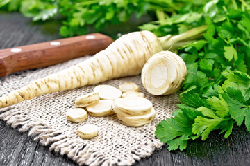 Parsley root chopped on dark board