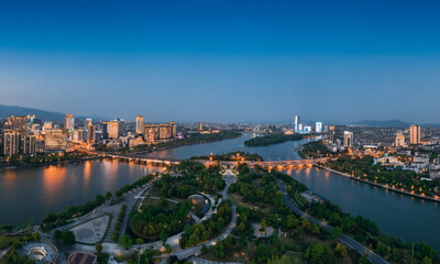 Fototapeta premium Urban environment at the intersection of Jinhua River，Yangjiang River and Wuyi River, Jinhua City, Zhejiang Province, China