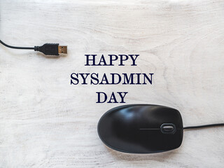 Happy Sysadmin Day. Beautiful greeting card. Close-up, view from above. Preparation for a professional holiday. Congratulations for family, relatives, friends and colleagues