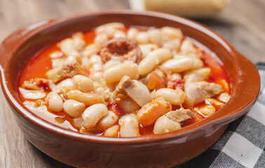Closeup shot of beans pottage rioja with bacon and sausage on a bowl