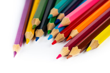 Fototapeta premium multicolored pencils isolated on white, many different drawing supplies
