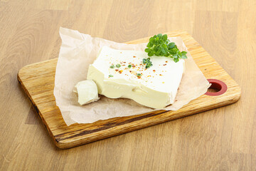 Greek Feta cheese over board